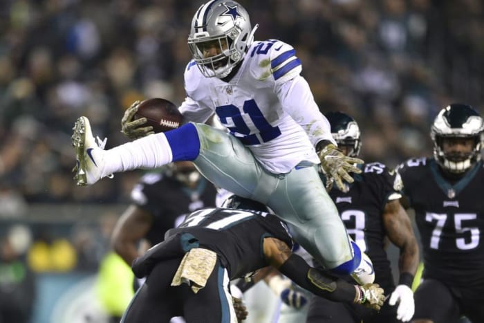 Former-state-champion-hurdler-Ezekiel-Elliott-hops-Eagles-defender